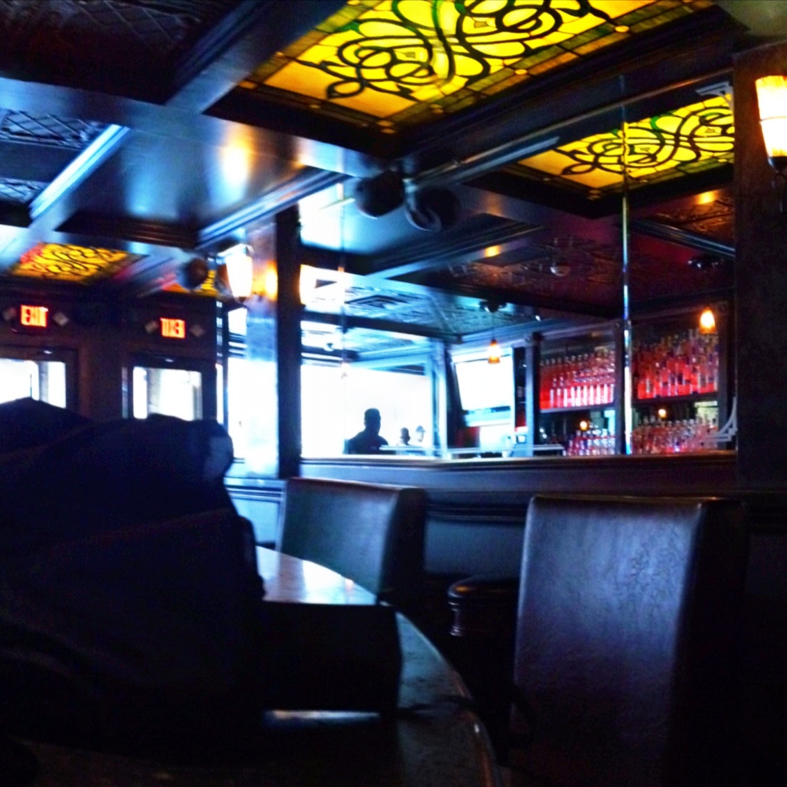  Photograph of bright bar interior. 